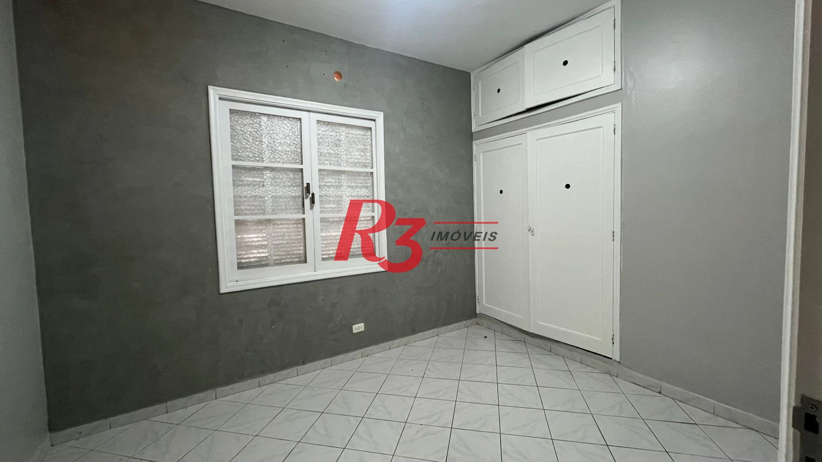 Casa com 3 dormitórios à venda, 171 m² por R$ 900.000,00 - Ponta da Praia - Santos/SP