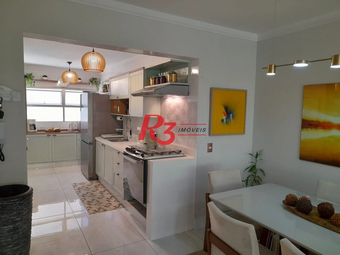 Apartamento com 3 dormitórios à venda, 140 m² por R$ 750.000,00 - Centro - Guarujá/SP