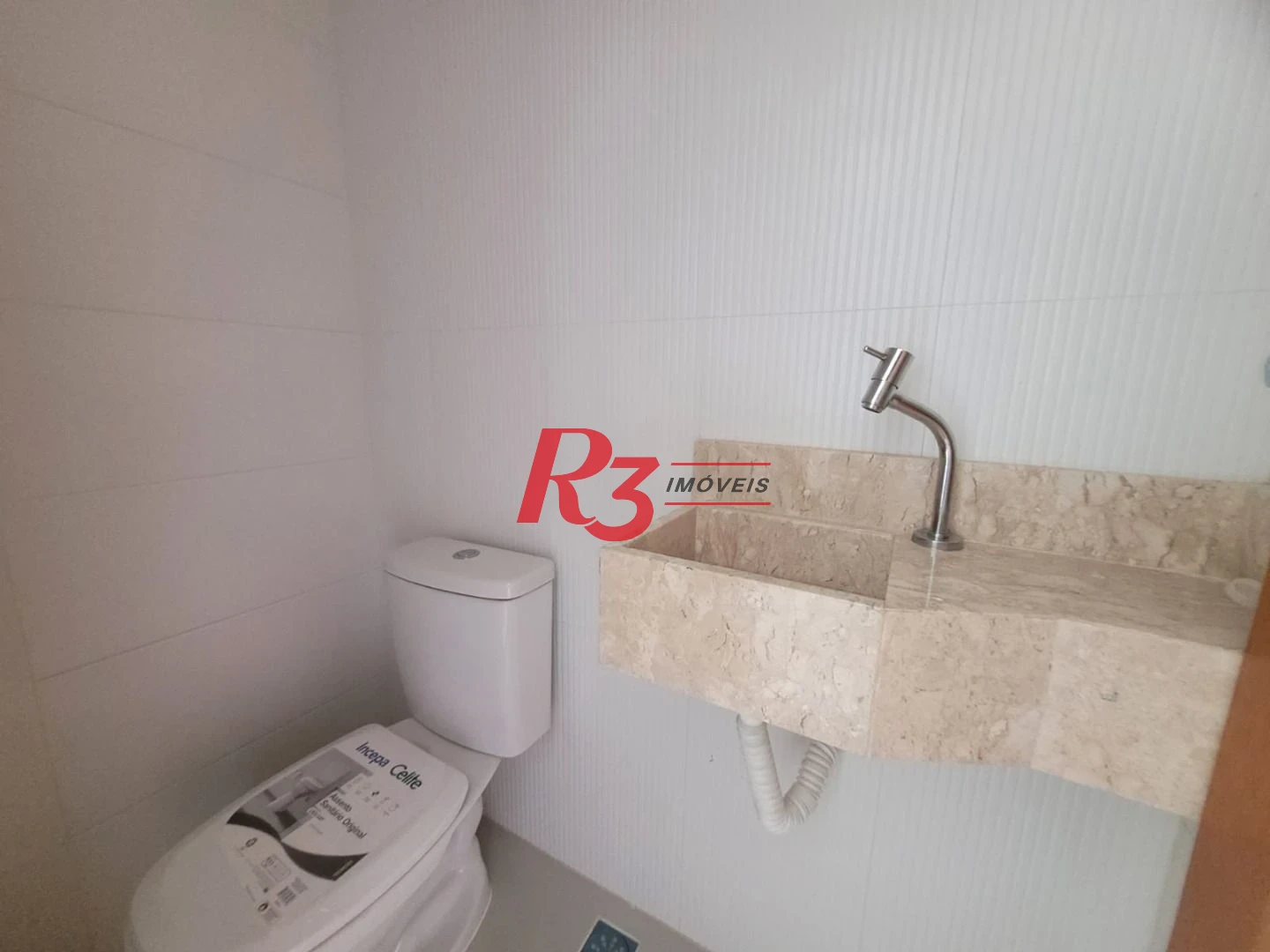 Casa com 3 dormitórios à venda, 134 m² por R$ 945.000,00 - Aparecida - Santos/SP