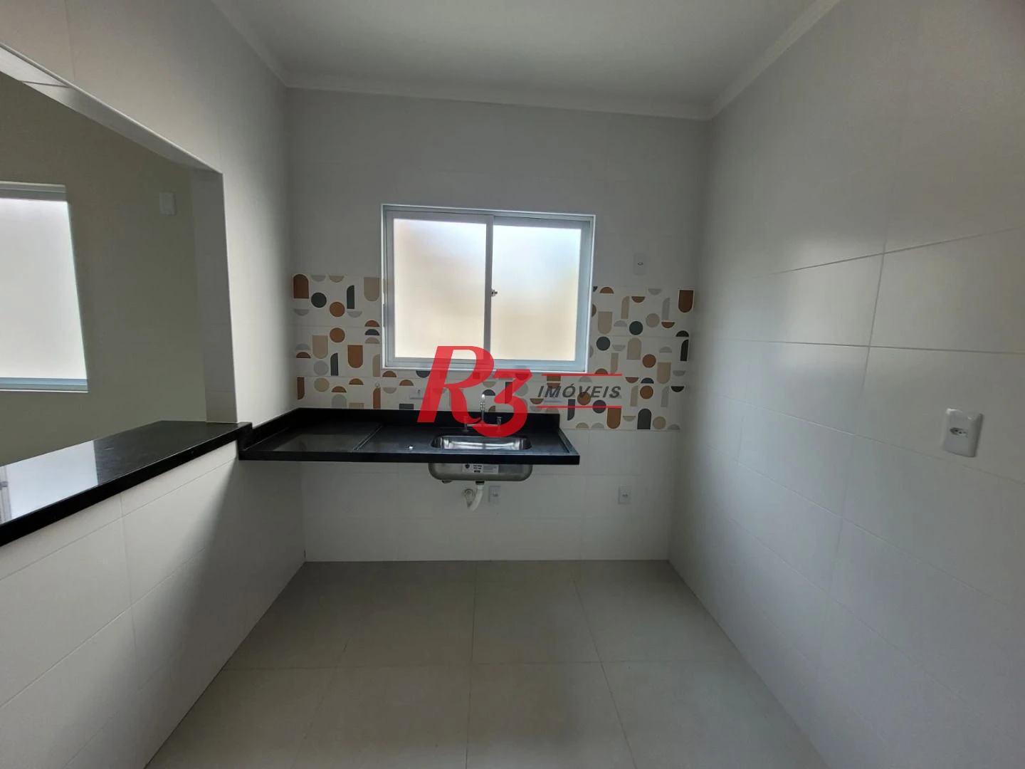 Casa com 3 dormitórios à venda, 134 m² por R$ 945.000,00 - Aparecida - Santos/SP
