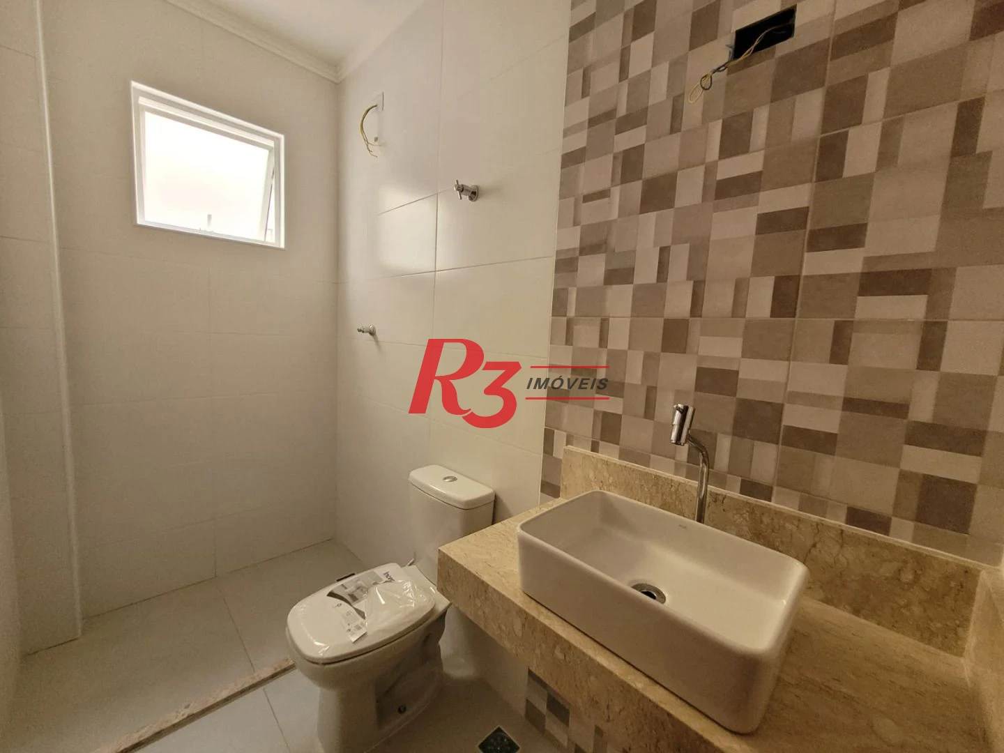 Casa com 3 dormitórios à venda, 134 m² por R$ 945.000,00 - Aparecida - Santos/SP