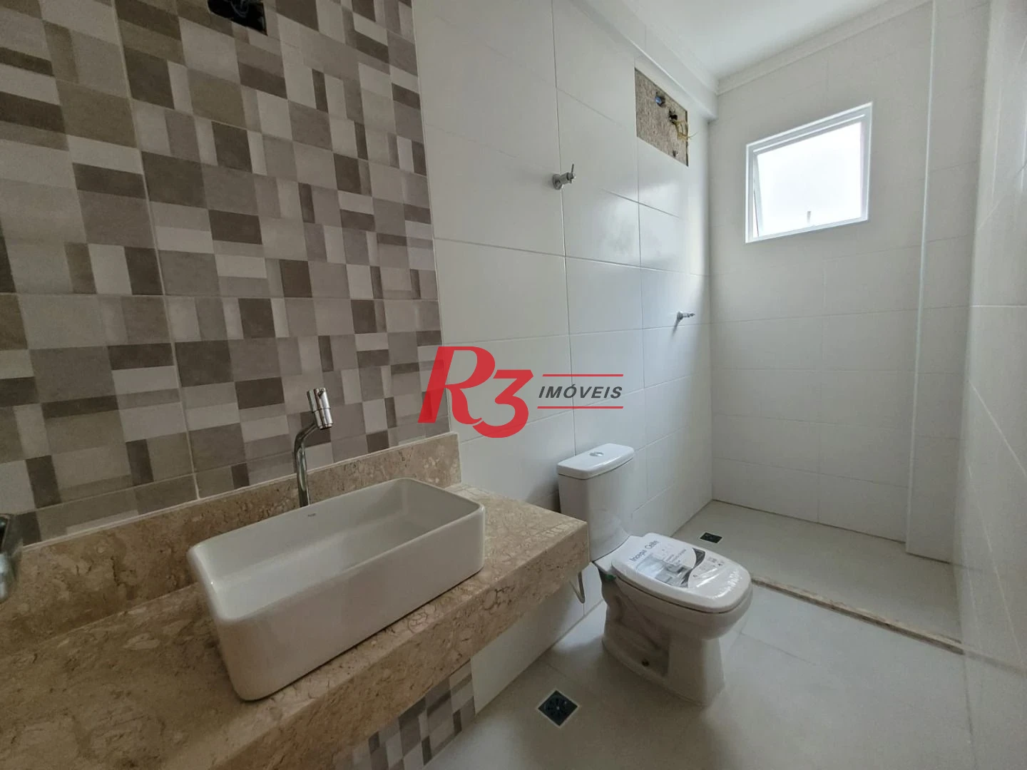 Casa com 3 dormitórios à venda, 134 m² por R$ 945.000,00 - Aparecida - Santos/SP