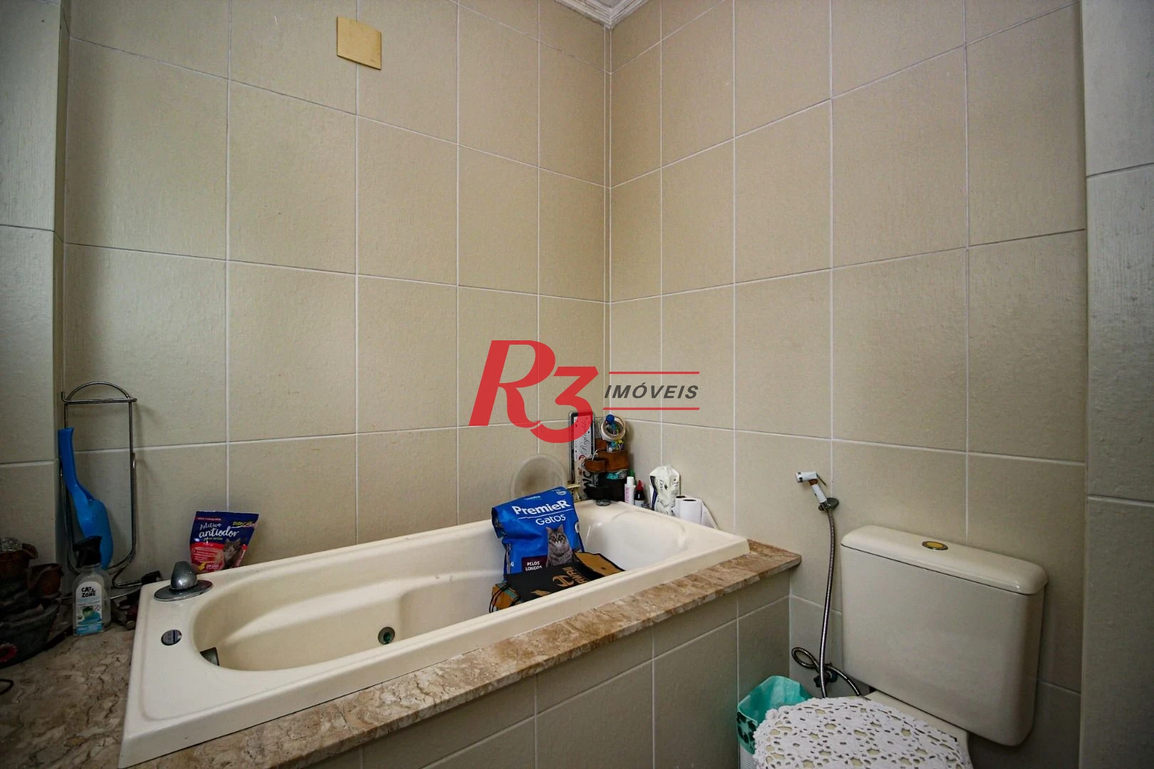 Casa com 3 dormitórios à venda, 155 m² por R$ 1.910.000,00 - Embaré - Santos/SP