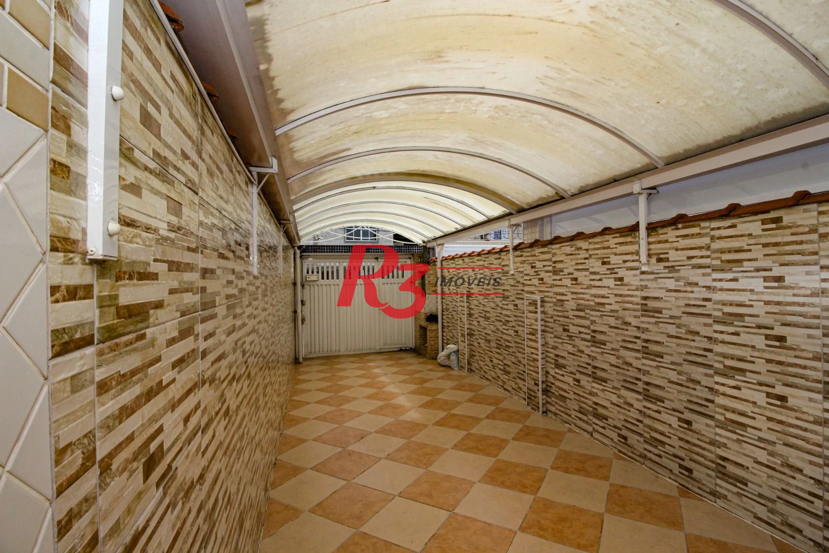 Sobrado com 3 dormitórios à venda, 136 m² por R$ 780.000,00 - Vila Valença - São Vicente/SP