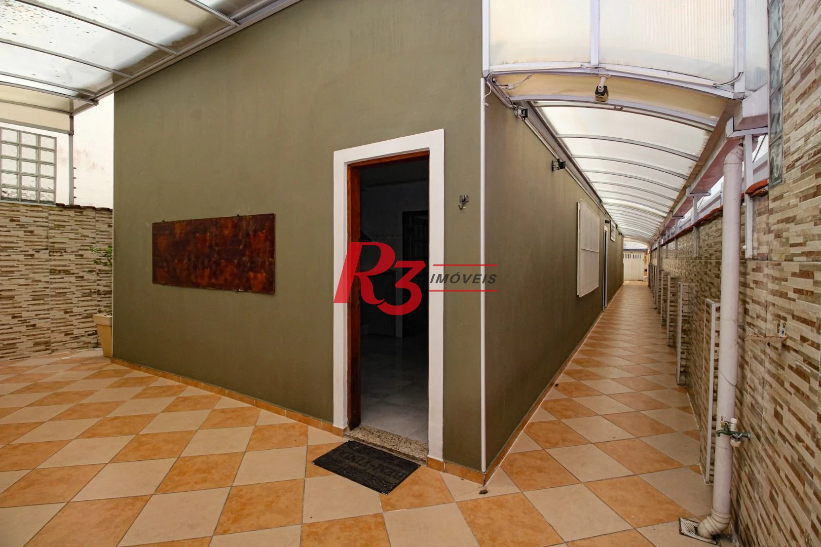 Sobrado com 3 dormitórios à venda, 136 m² por R$ 780.000,00 - Vila Valença - São Vicente/SP