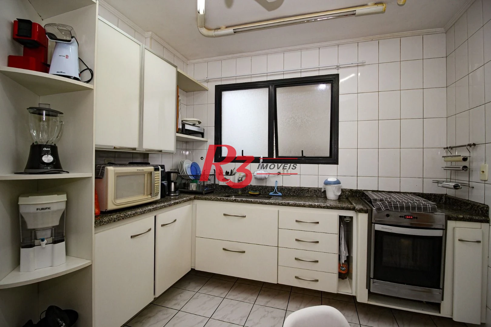 Apartamento com 2 dormitórios à venda, 82 m² por R$ 620.000,00 - Embaré - Santos/SP