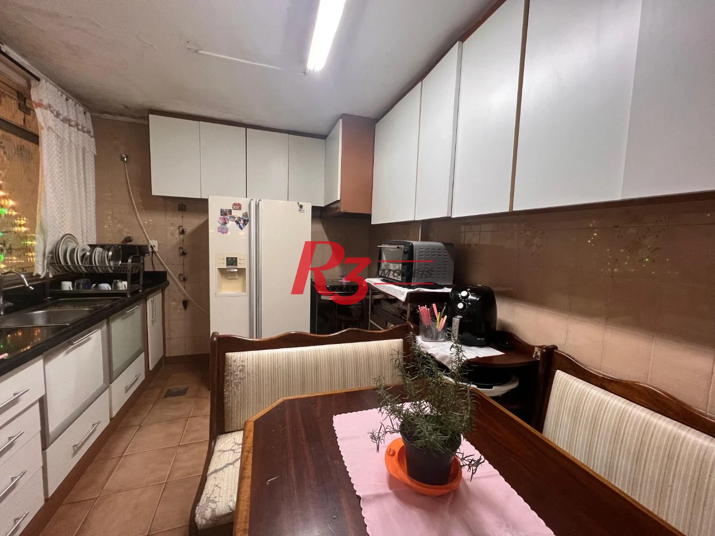 Casa com 3 dormitórios à venda, 148 m² por R$ 1.180.000,00 - Embaré - Santos/SP