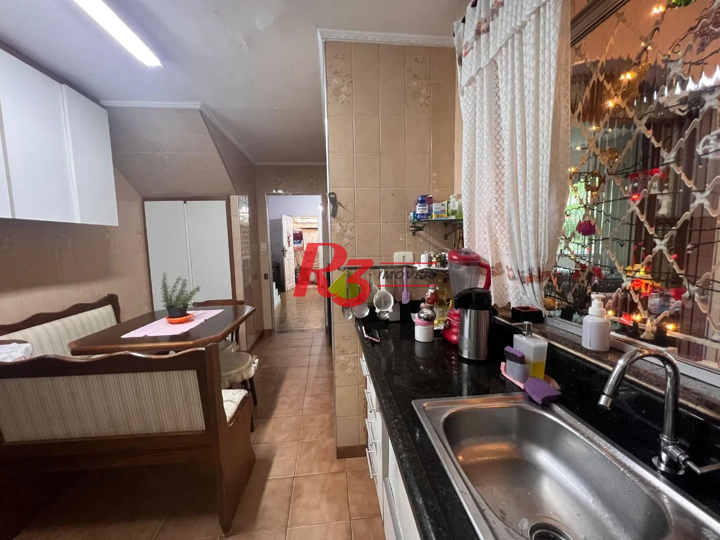 Casa com 3 dormitórios à venda, 148 m² por R$ 1.180.000,00 - Embaré - Santos/SP
