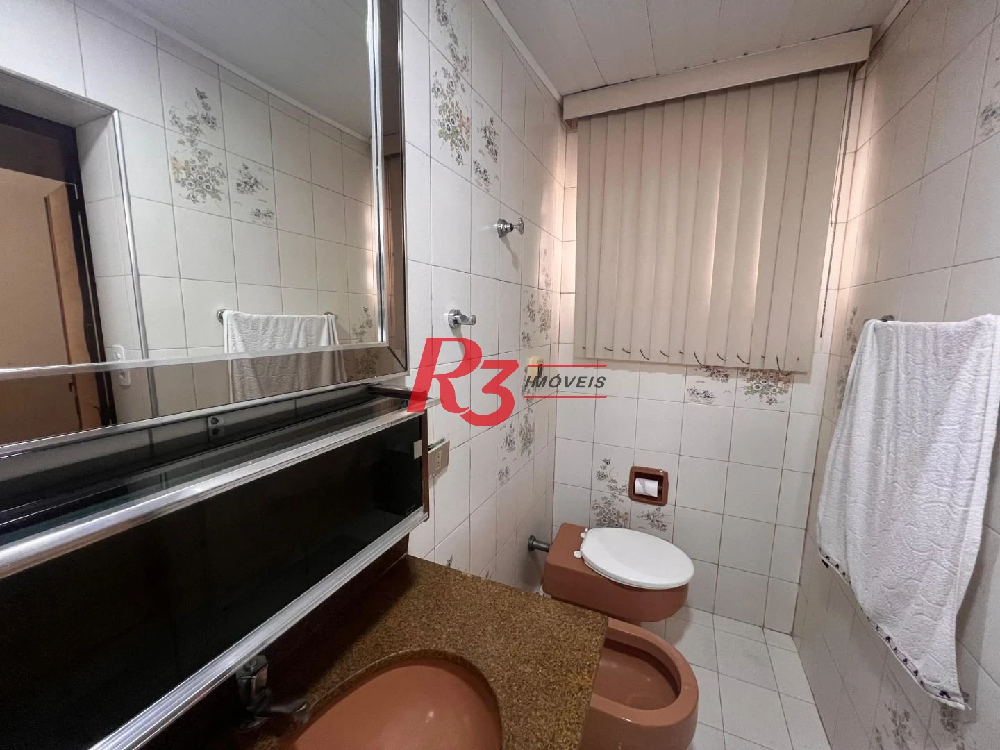 Casa com 3 dormitórios à venda, 148 m² por R$ 1.180.000,00 - Embaré - Santos/SP