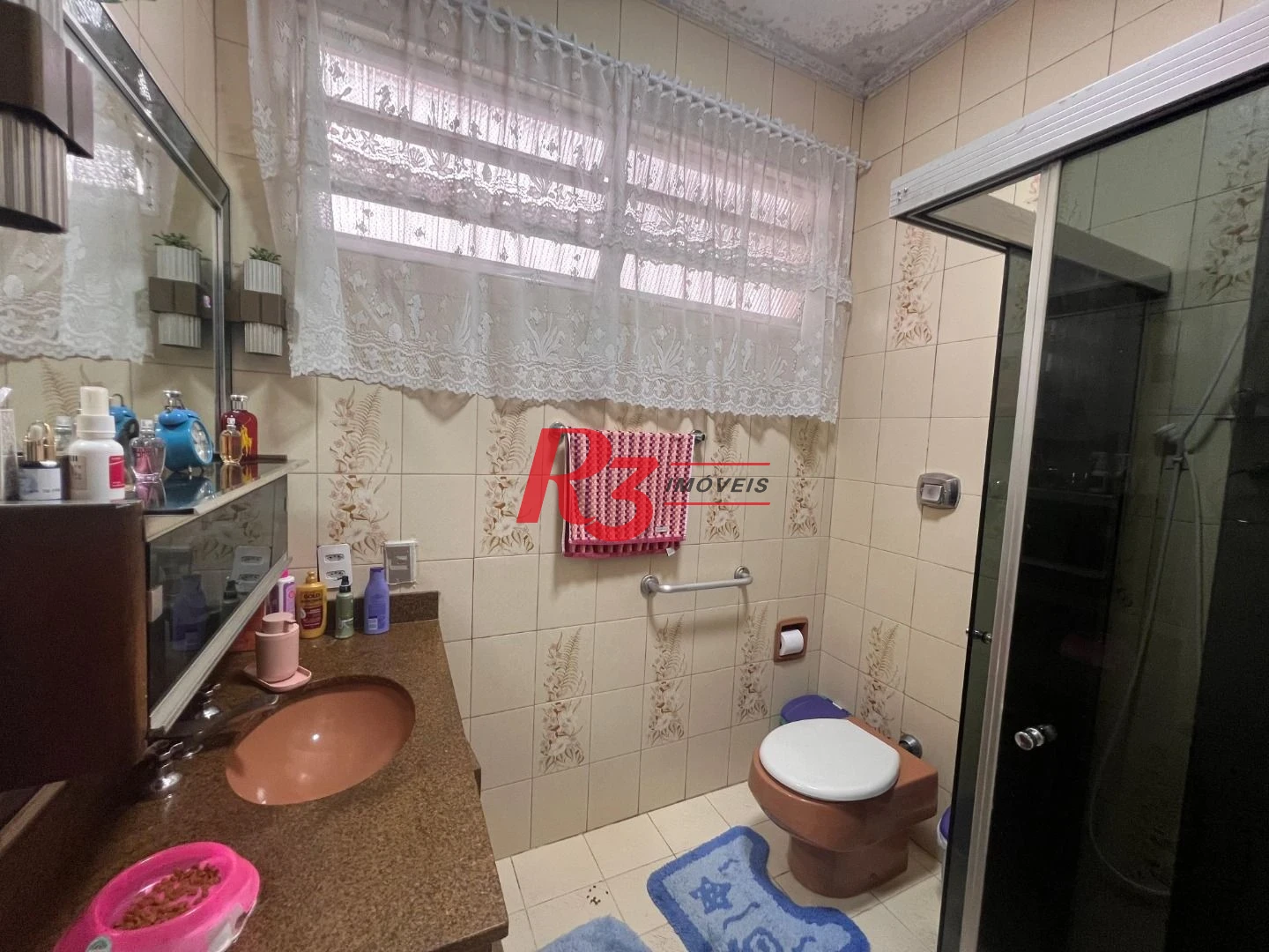 Casa com 3 dormitórios à venda, 148 m² por R$ 1.180.000,00 - Embaré - Santos/SP