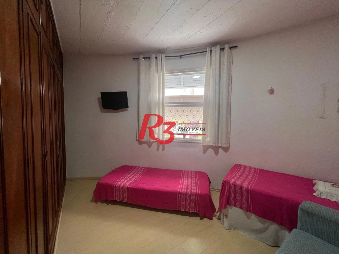 Casa com 3 dormitórios à venda, 148 m² por R$ 1.180.000,00 - Embaré - Santos/SP