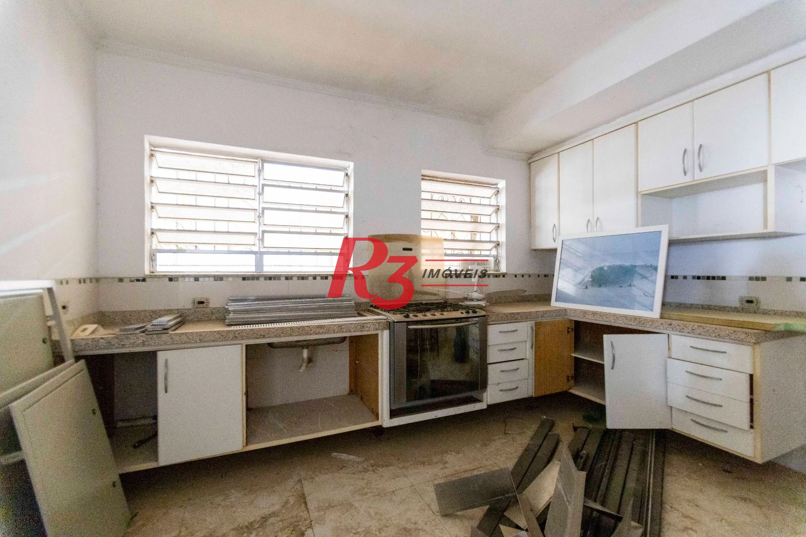 Sobrado com 4 dormitórios à venda, 258 m² por R$ 3.750.000,00 - Ponta da Praia - Santos/SP