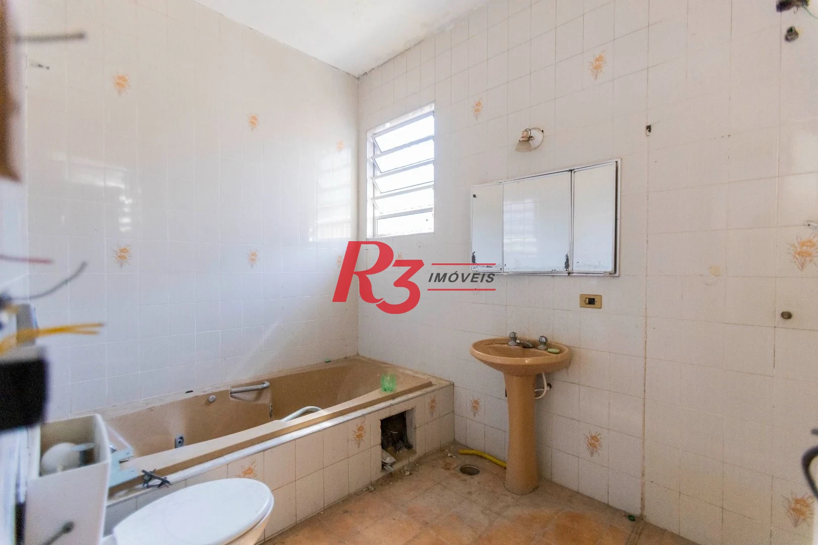 Sobrado com 4 dormitórios à venda, 258 m² por R$ 3.750.000,00 - Ponta da Praia - Santos/SP
