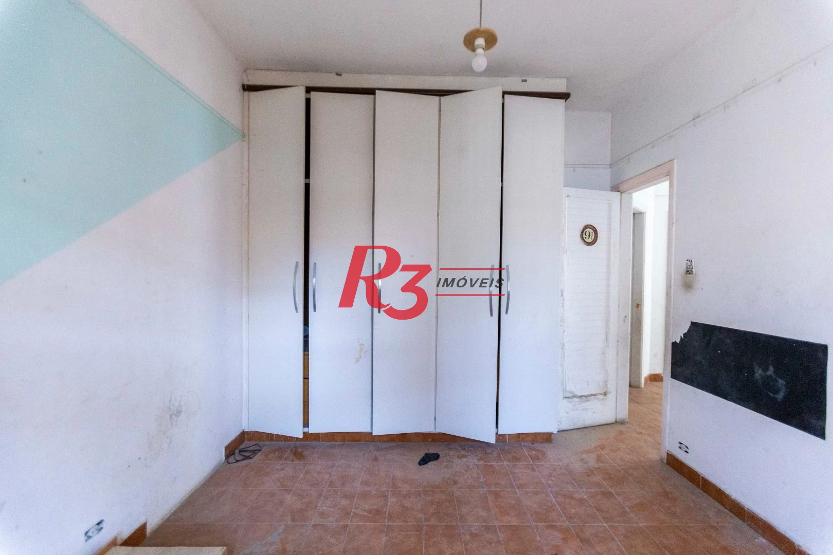 Sobrado com 4 dormitórios à venda, 258 m² por R$ 3.750.000,00 - Ponta da Praia - Santos/SP