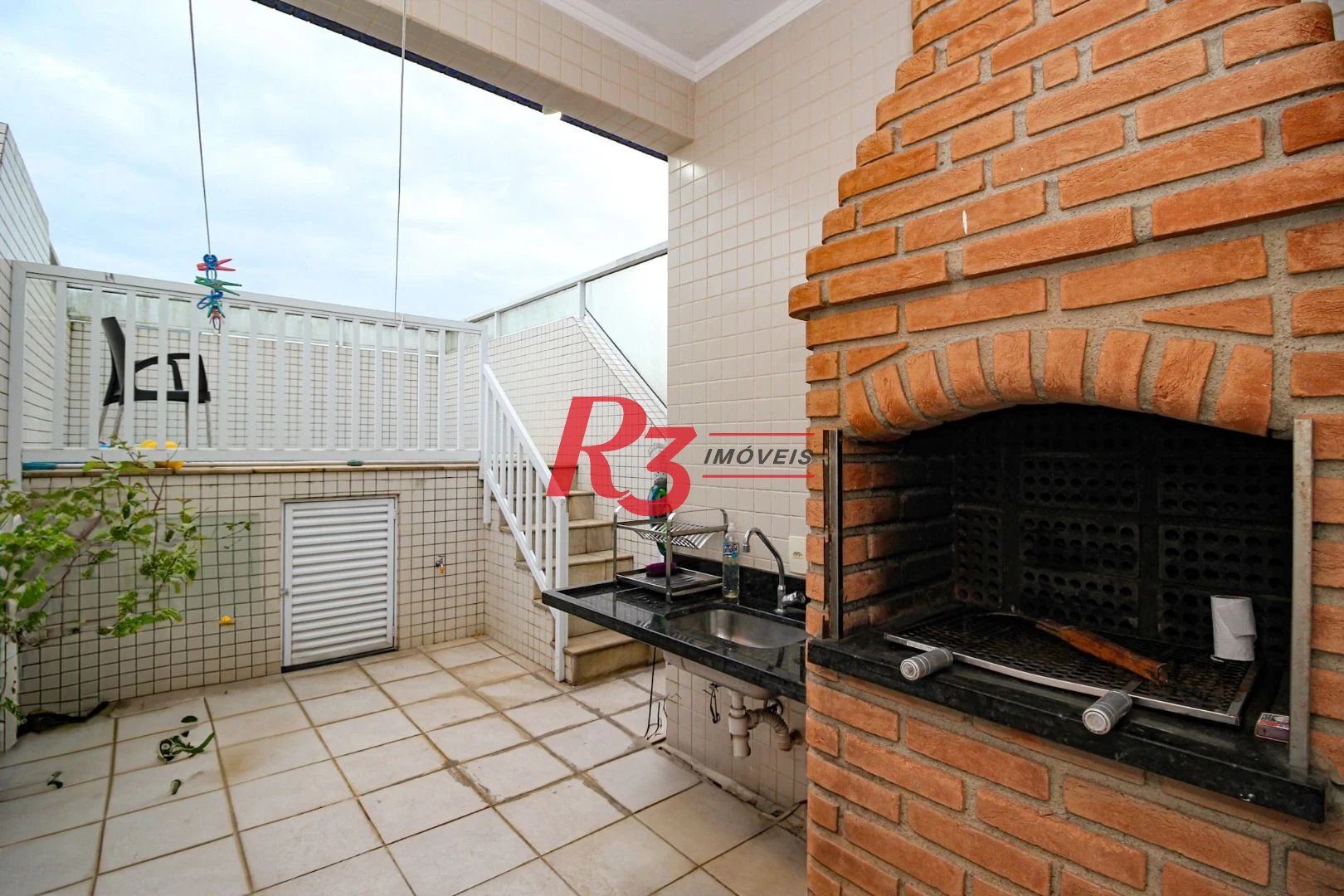 Casa com 3 dormitórios à venda, 165 m² por R$ 1.250.000,00 - Aparecida - Santos/SP