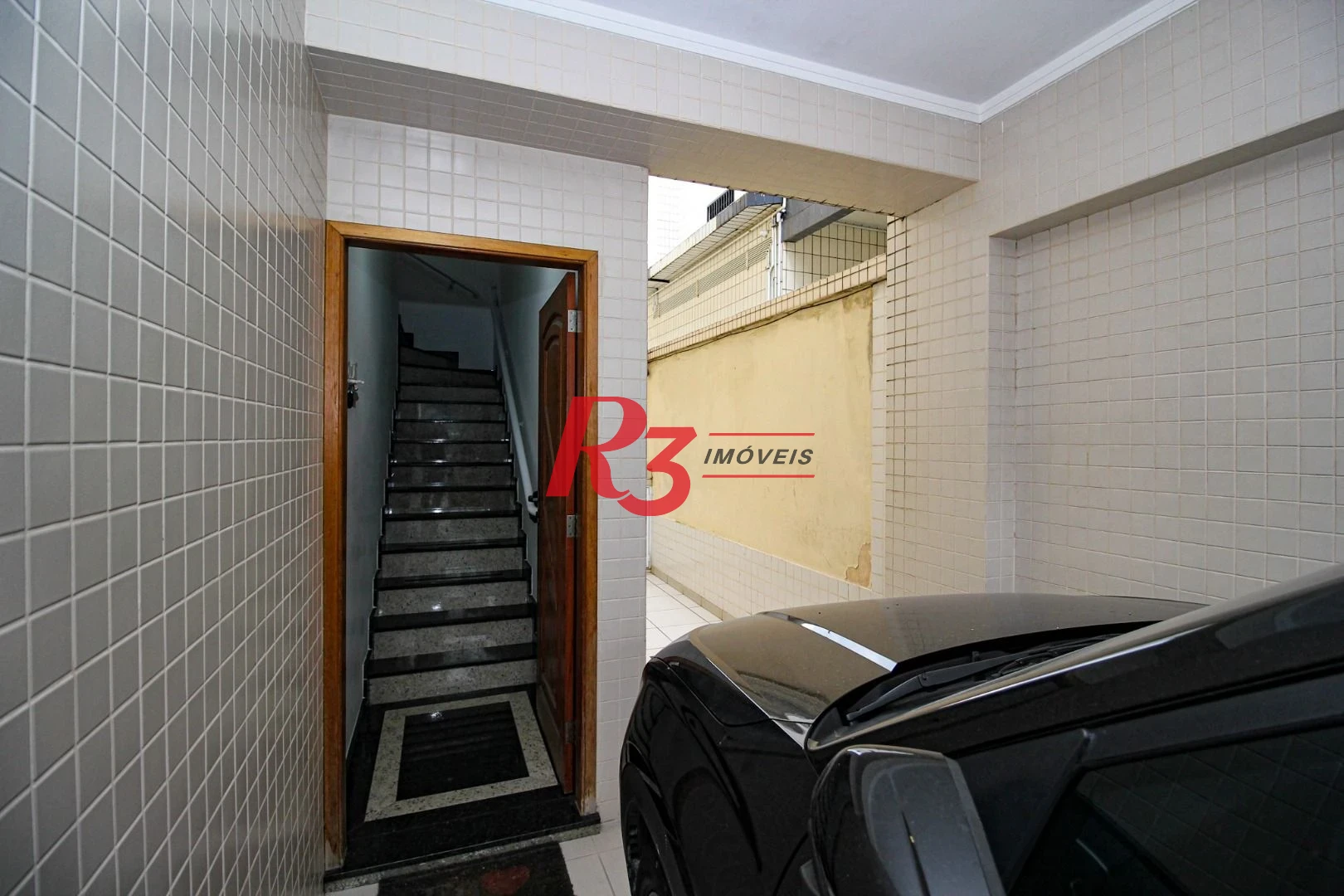 Casa com 3 dormitórios à venda, 165 m² por R$ 1.250.000,00 - Aparecida - Santos/SP