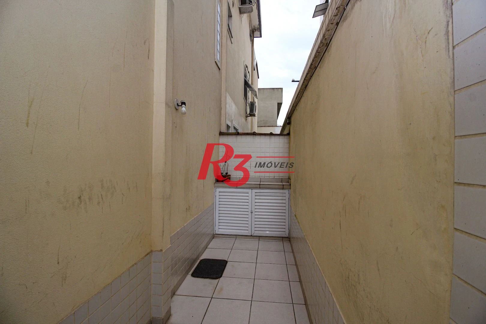 Casa com 3 dormitórios à venda, 165 m² por R$ 1.250.000,00 - Aparecida - Santos/SP