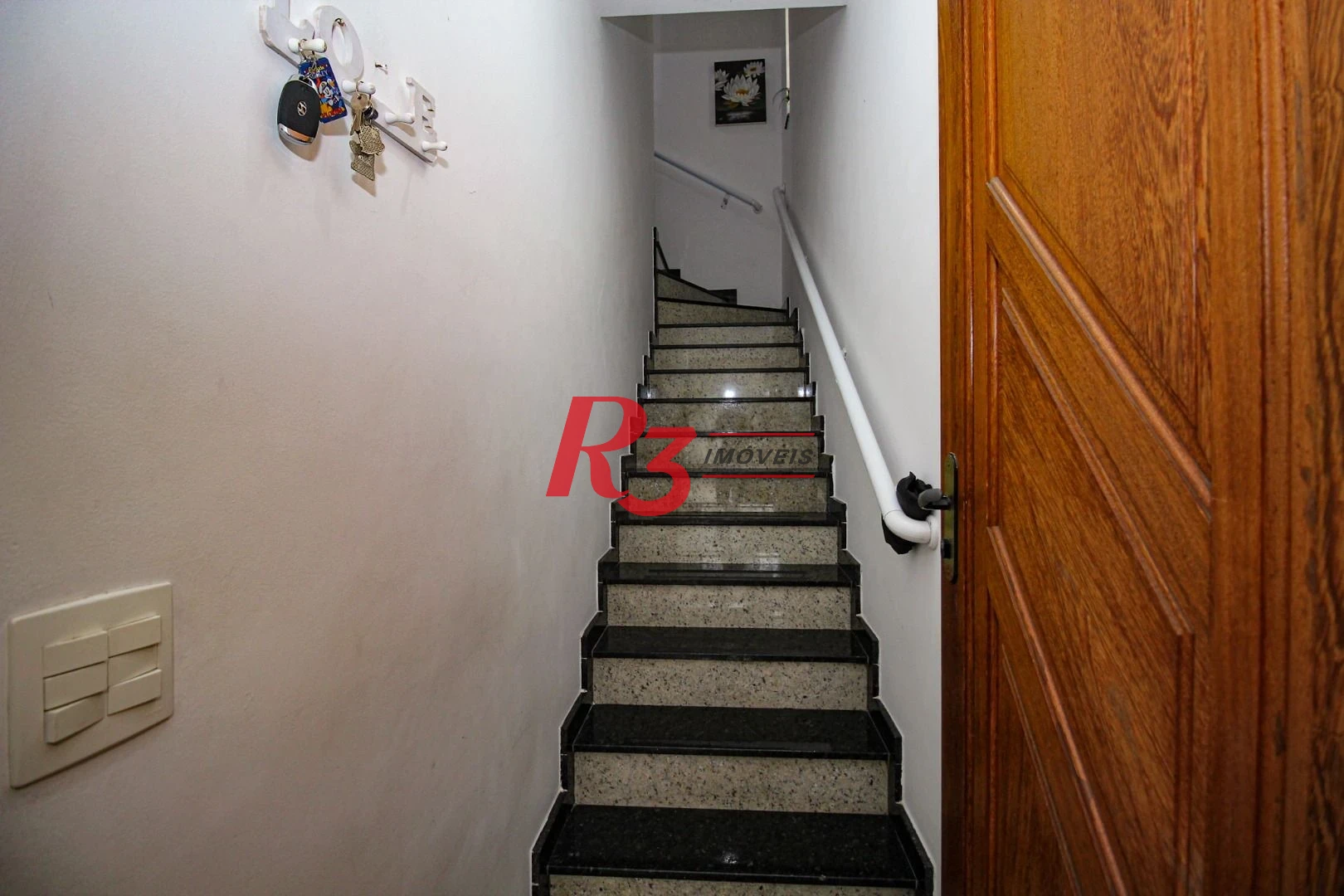 Casa com 3 dormitórios à venda, 165 m² por R$ 1.250.000,00 - Aparecida - Santos/SP