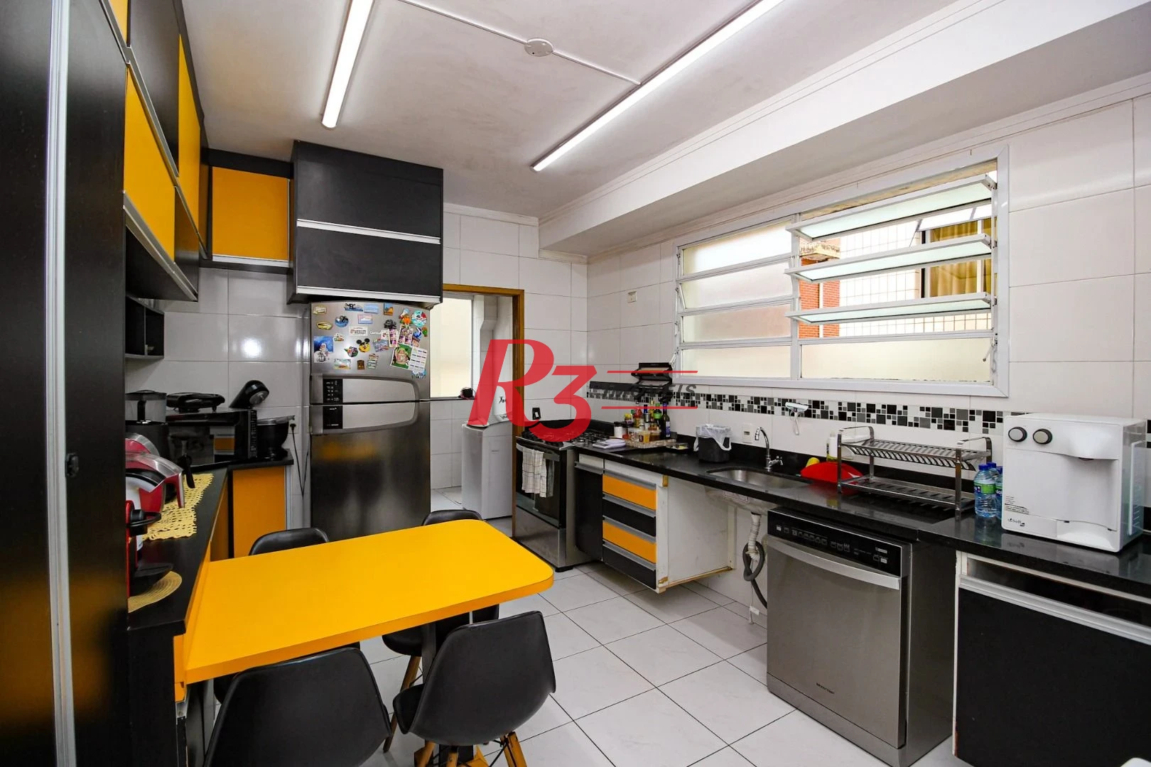 Casa com 3 dormitórios à venda, 165 m² por R$ 1.250.000,00 - Aparecida - Santos/SP