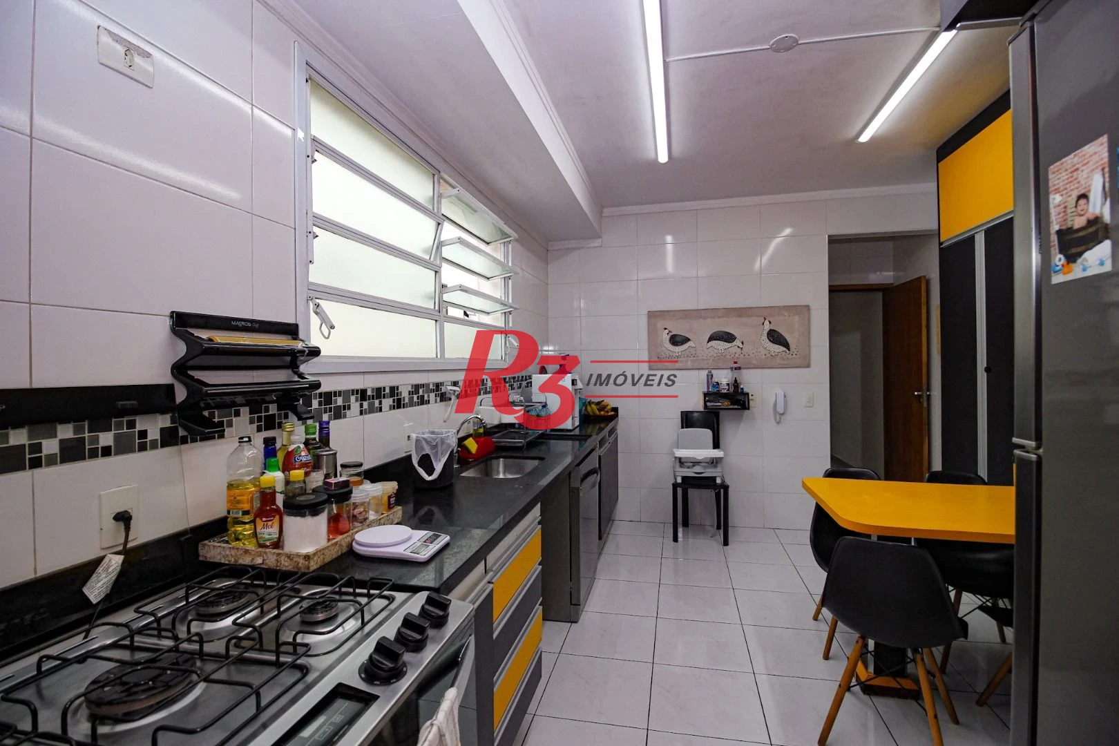 Casa com 3 dormitórios à venda, 165 m² por R$ 1.250.000,00 - Aparecida - Santos/SP