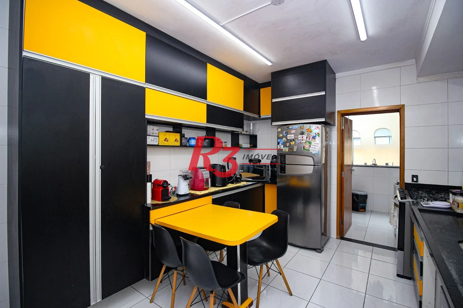 Casa com 3 dormitórios à venda, 165 m² por R$ 1.250.000,00 - Aparecida - Santos/SP