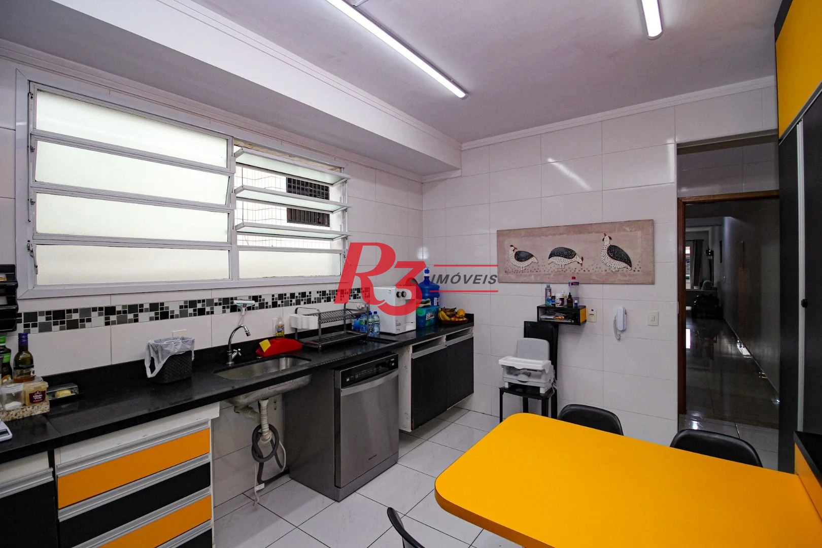 Casa com 3 dormitórios à venda, 165 m² por R$ 1.250.000,00 - Aparecida - Santos/SP