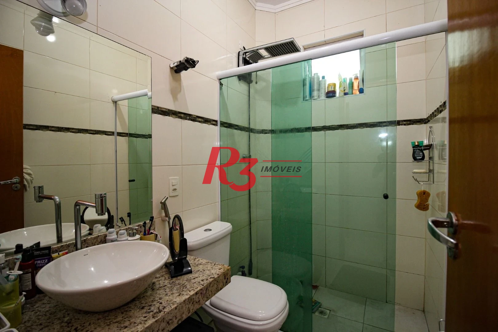 Casa com 3 dormitórios à venda, 165 m² por R$ 1.250.000,00 - Aparecida - Santos/SP