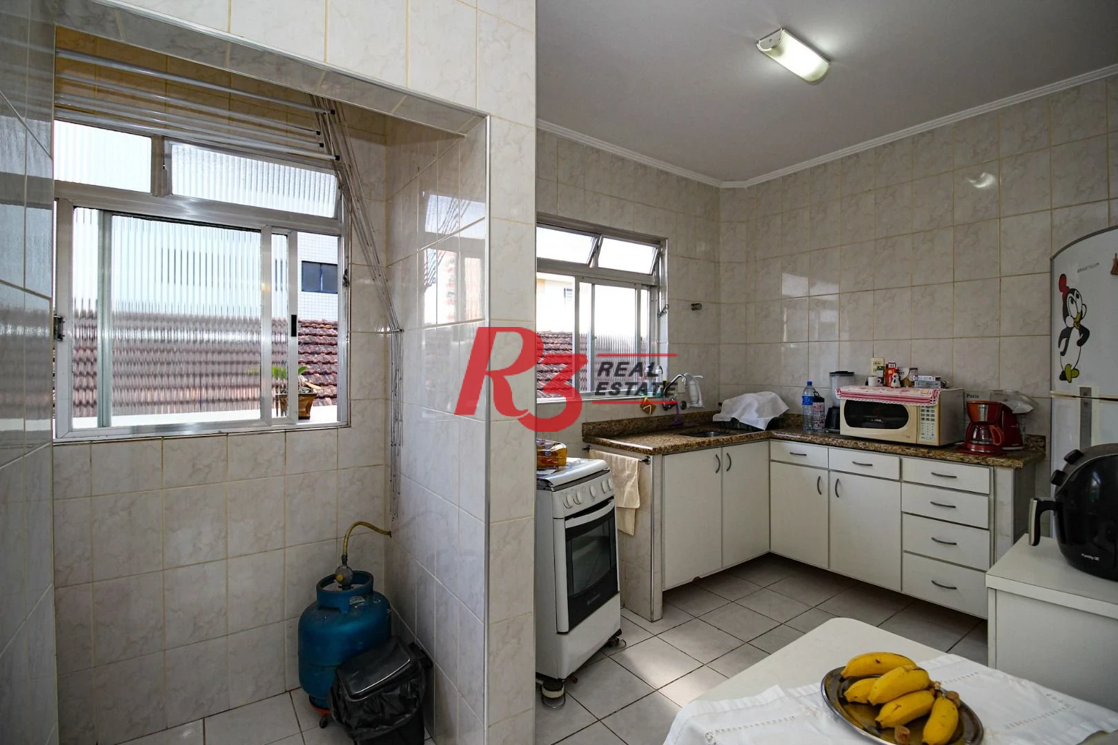 Apartamento à venda, 60 m² por R$ 395.000,00 - Gonzaga - Santos/SP
