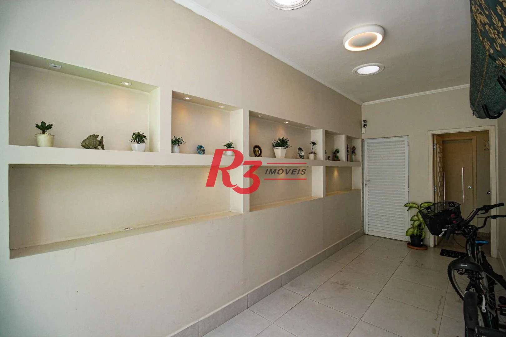 Casa à venda, 240 m² por R$ 2.600.000,00 - Ponta da Praia - Santos/SP