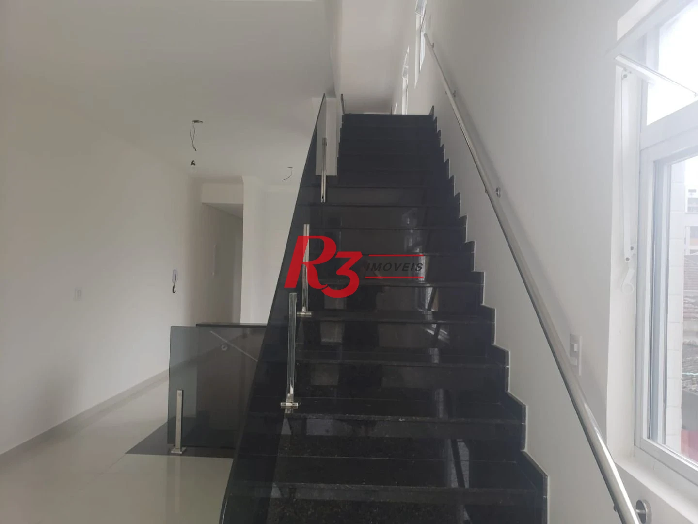 Casa com 3 dormitórios à venda, 155 m² por R$ 1.275.000,00 - Embaré - Santos/SP