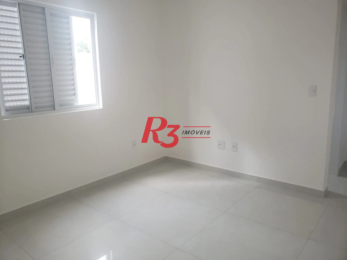Casa com 3 dormitórios à venda, 155 m² por R$ 1.275.000,00 - Embaré - Santos/SP
