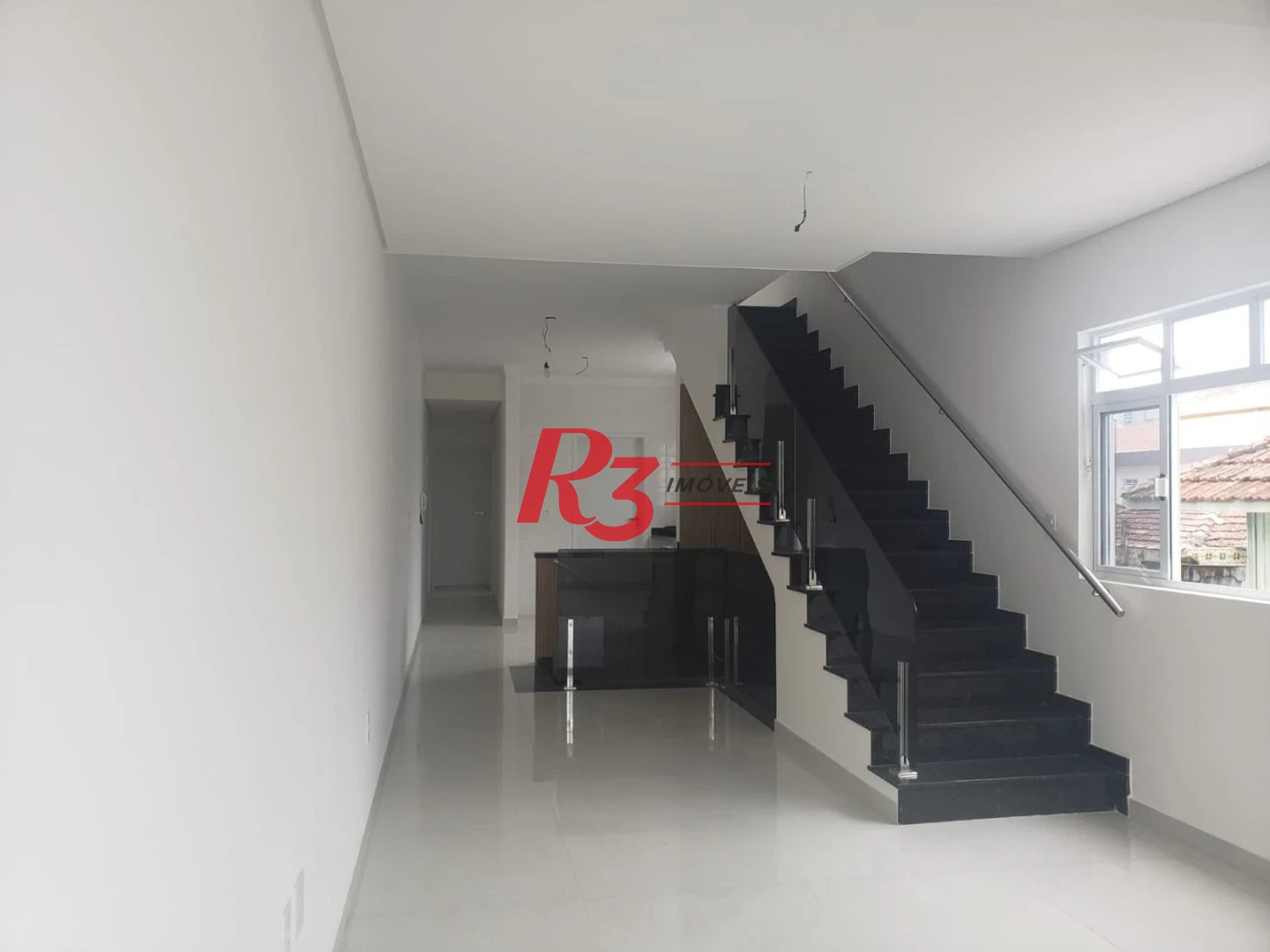 Casa com 3 dormitórios à venda, 155 m² por R$ 1.275.000,00 - Embaré - Santos/SP