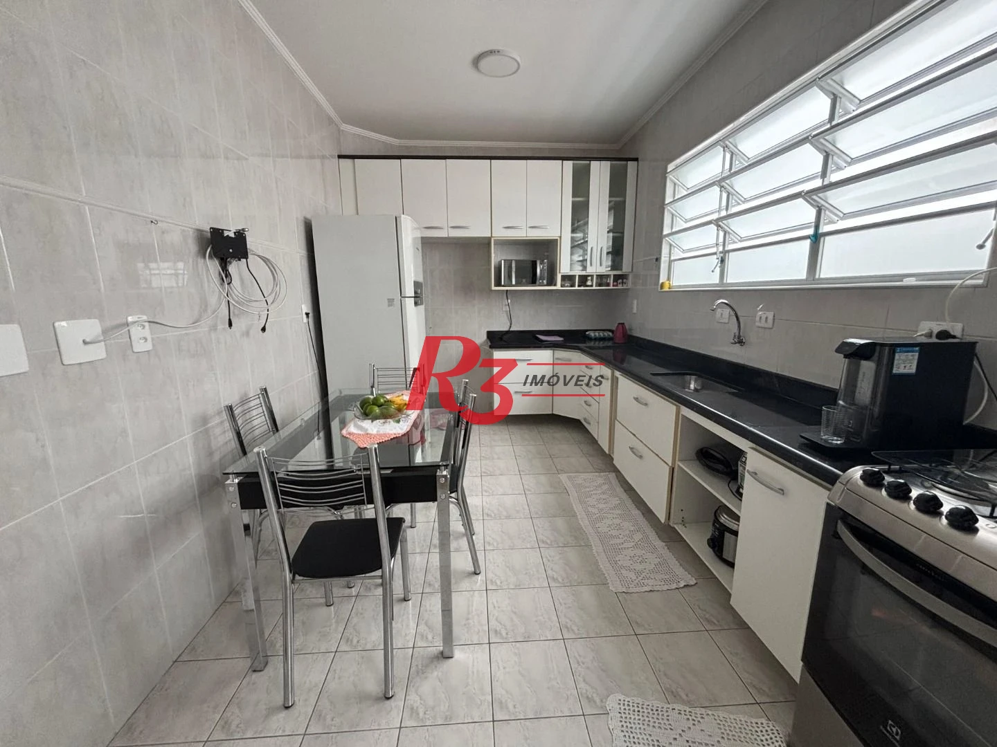 Casa com 4 dormitórios à venda, 277 m² por R$ 1.800.000,00 - Boqueirão - Santos/SP