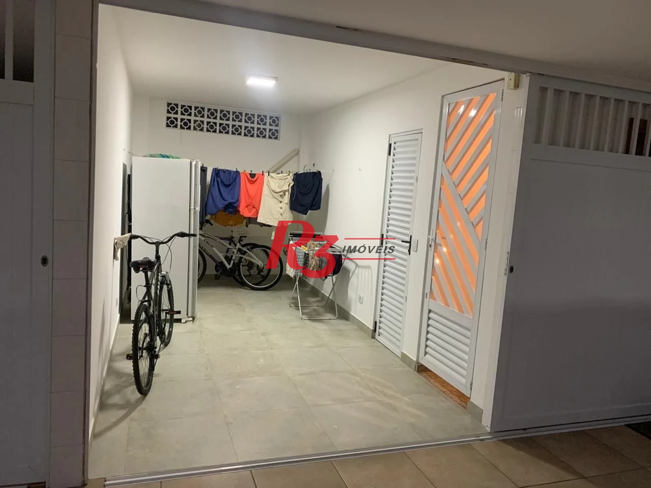 Village com 3 dormitórios à venda, 186 m² por R$ 1.278.000,00 - Gonzaga - Santos/SP