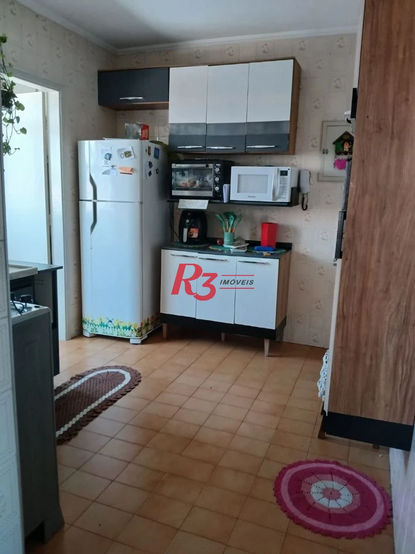 Apartamento com 2 dormitórios à venda, 65 m² por R$ 265.000,00 - Catiapoã - São Vicente/SP