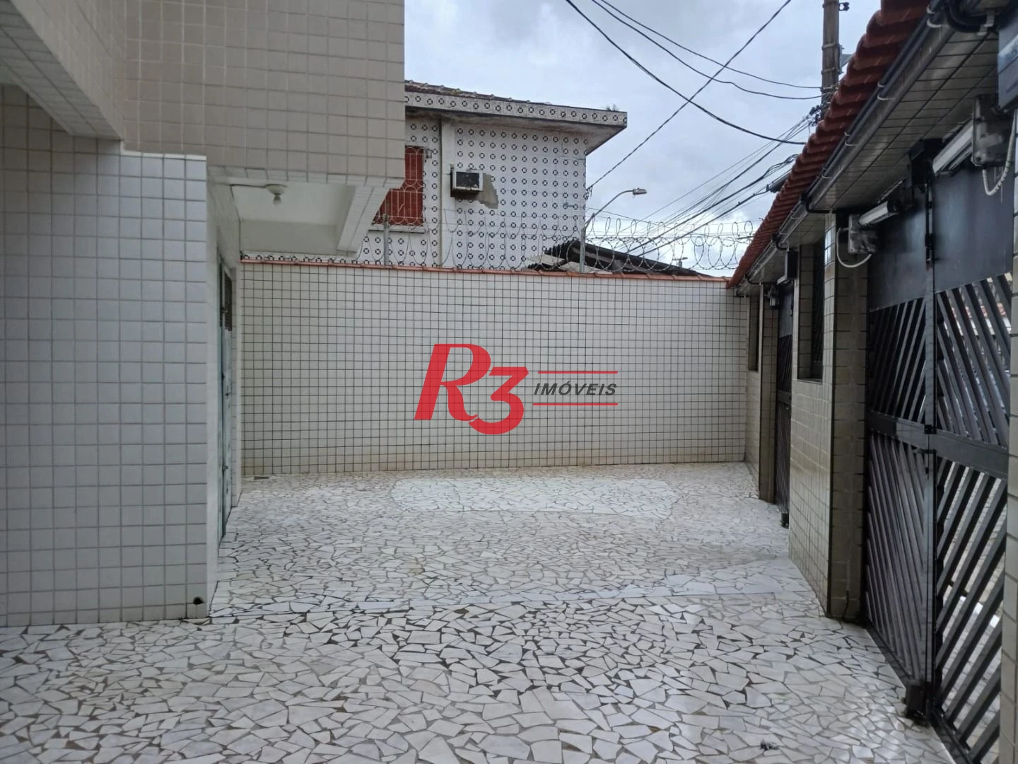 Apartamento com 2 dormitórios à venda, 65 m² por R$ 265.000,00 - Catiapoã - São Vicente/SP