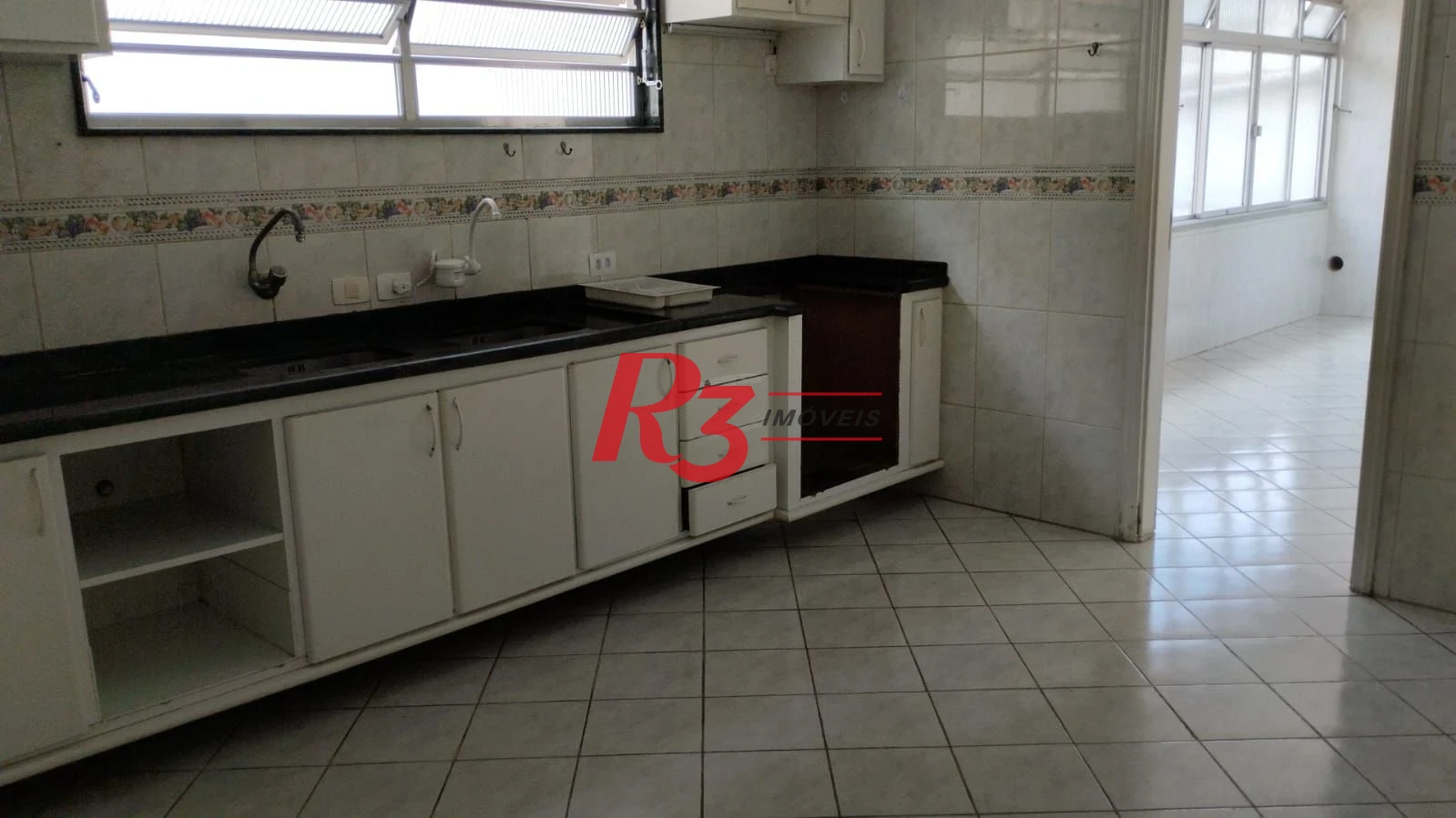 Casa com 3 dormitórios para alugar, 215 m² por R$ 6.916,01/mês - Ponta da Praia - Santos/SP