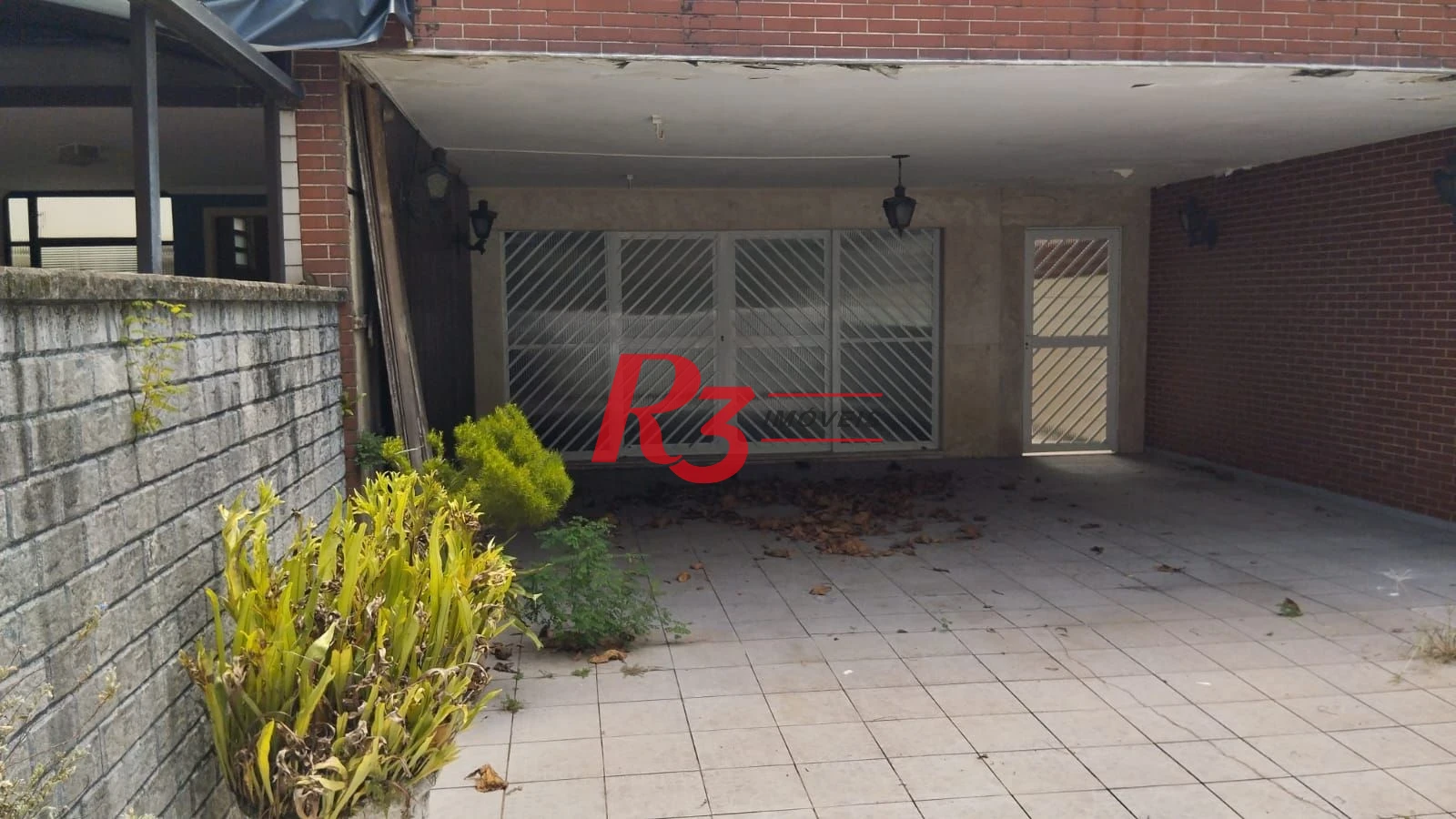 Casa com 4 dormitórios para alugar, 248 m² por R$ 9.650,90/mês - Ponta da Praia - Santos/SP