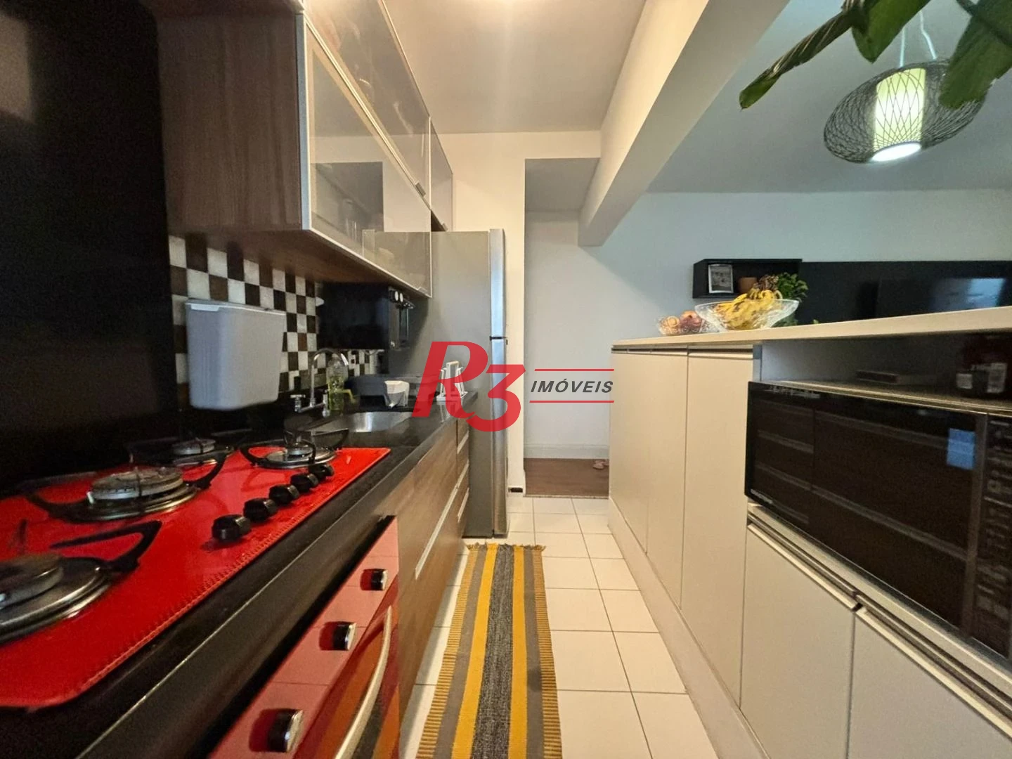 Apartamento com 2 dormitórios à venda, 66 m² por R$ 600.000,00 - Macuco - Santos/SP