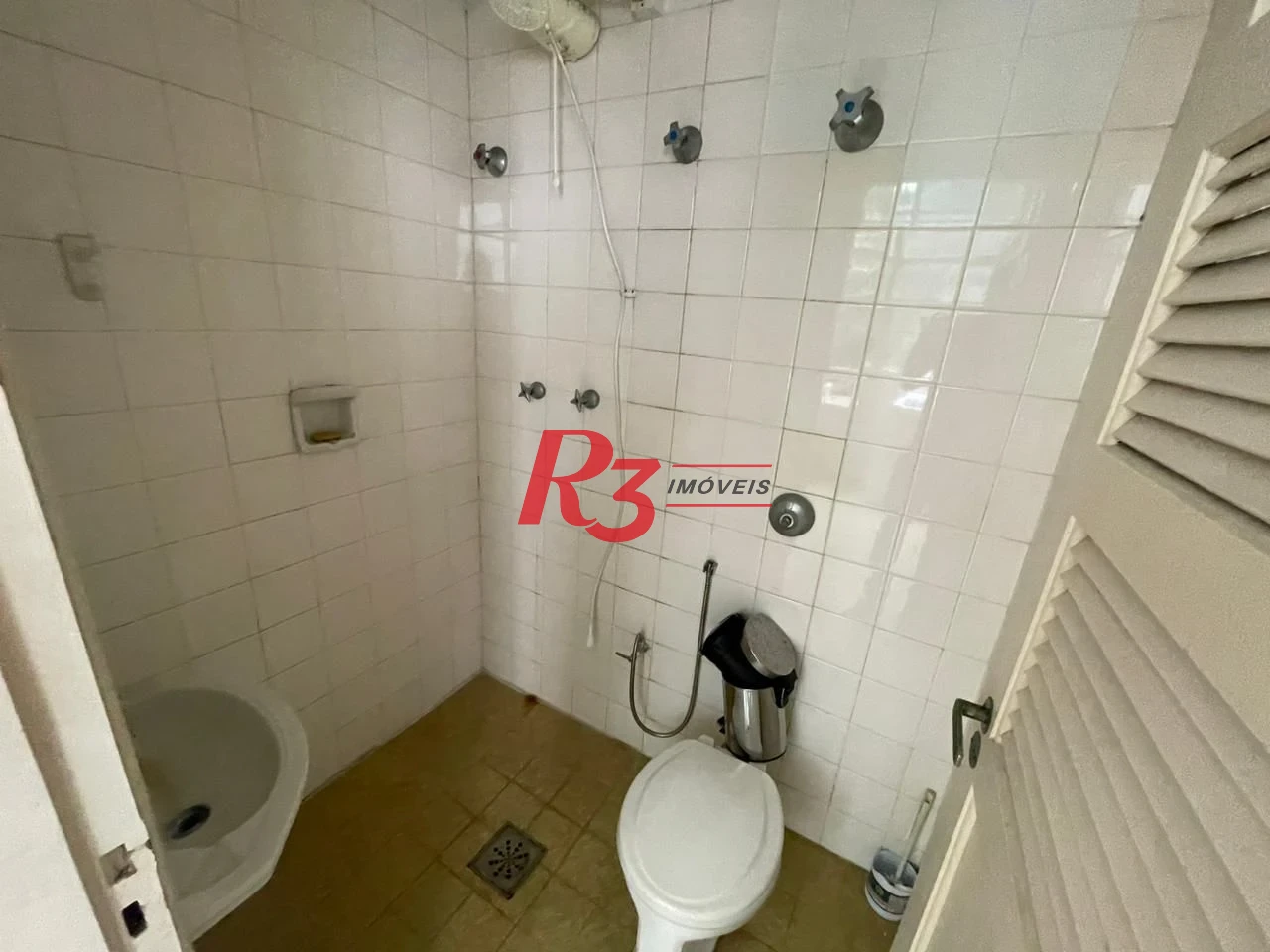 Apartamento com 4 dormitórios à venda, 235 m² por R$ 1.250.000,00 - Ilha Porchat - São Vicente/SP