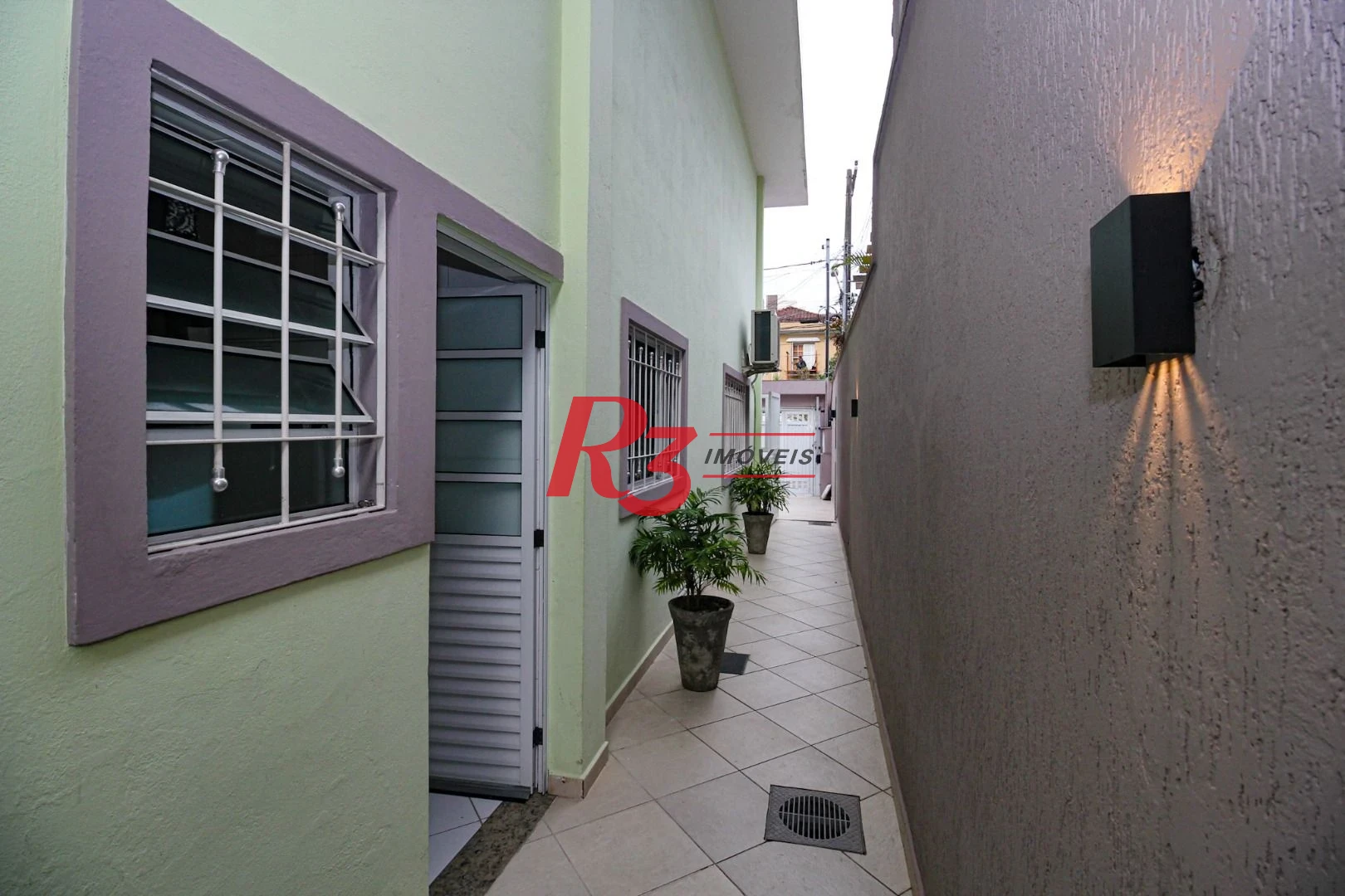 Casa com 3 dormitórios, 141 m² - venda por R$ 1.340.000,00 ou aluguel por R$ 8.500,01/mês - Marapé - Santos/SP