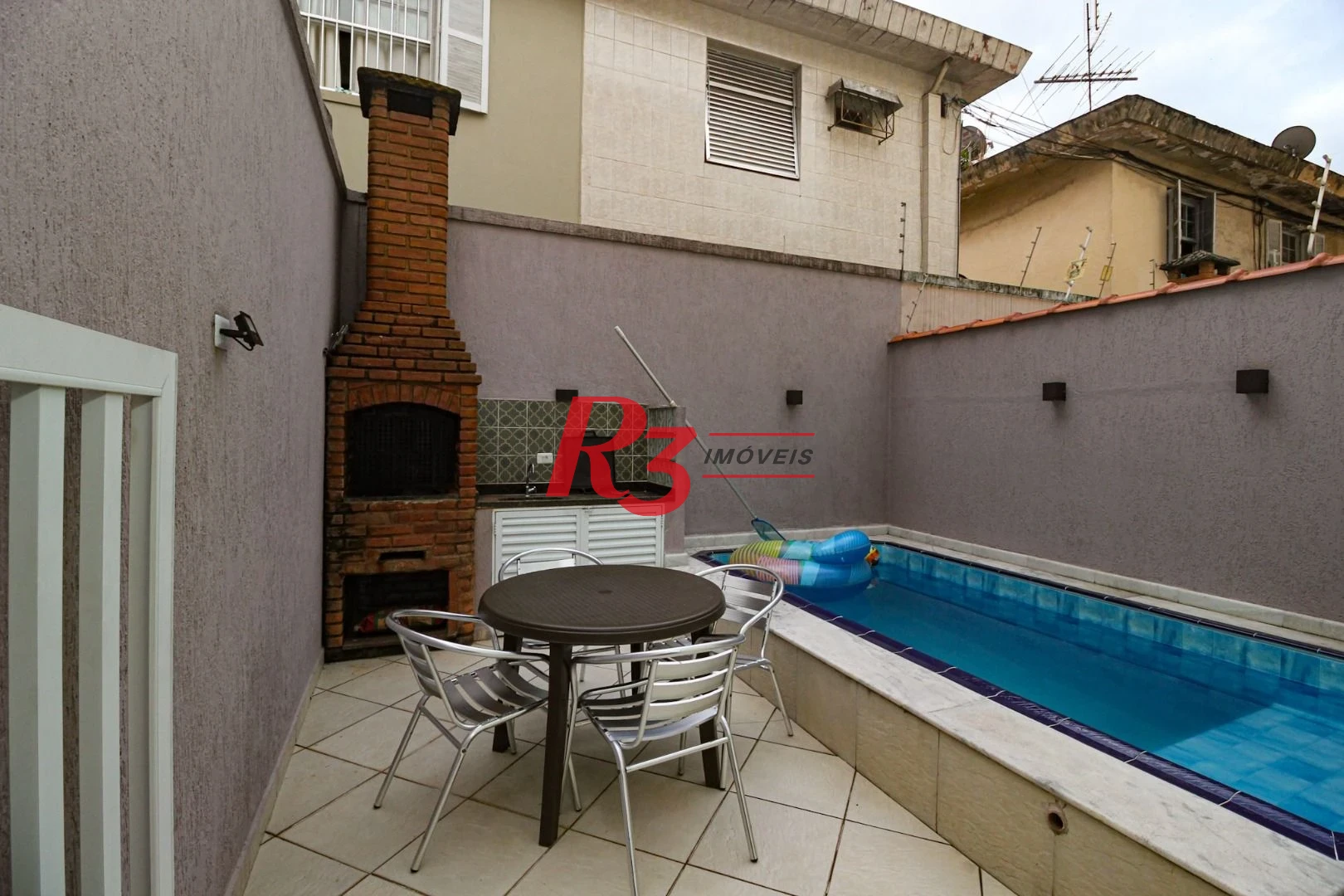 Casa com 3 dormitórios, 141 m² - venda por R$ 1.340.000,00 ou aluguel por R$ 8.500,01/mês - Marapé - Santos/SP