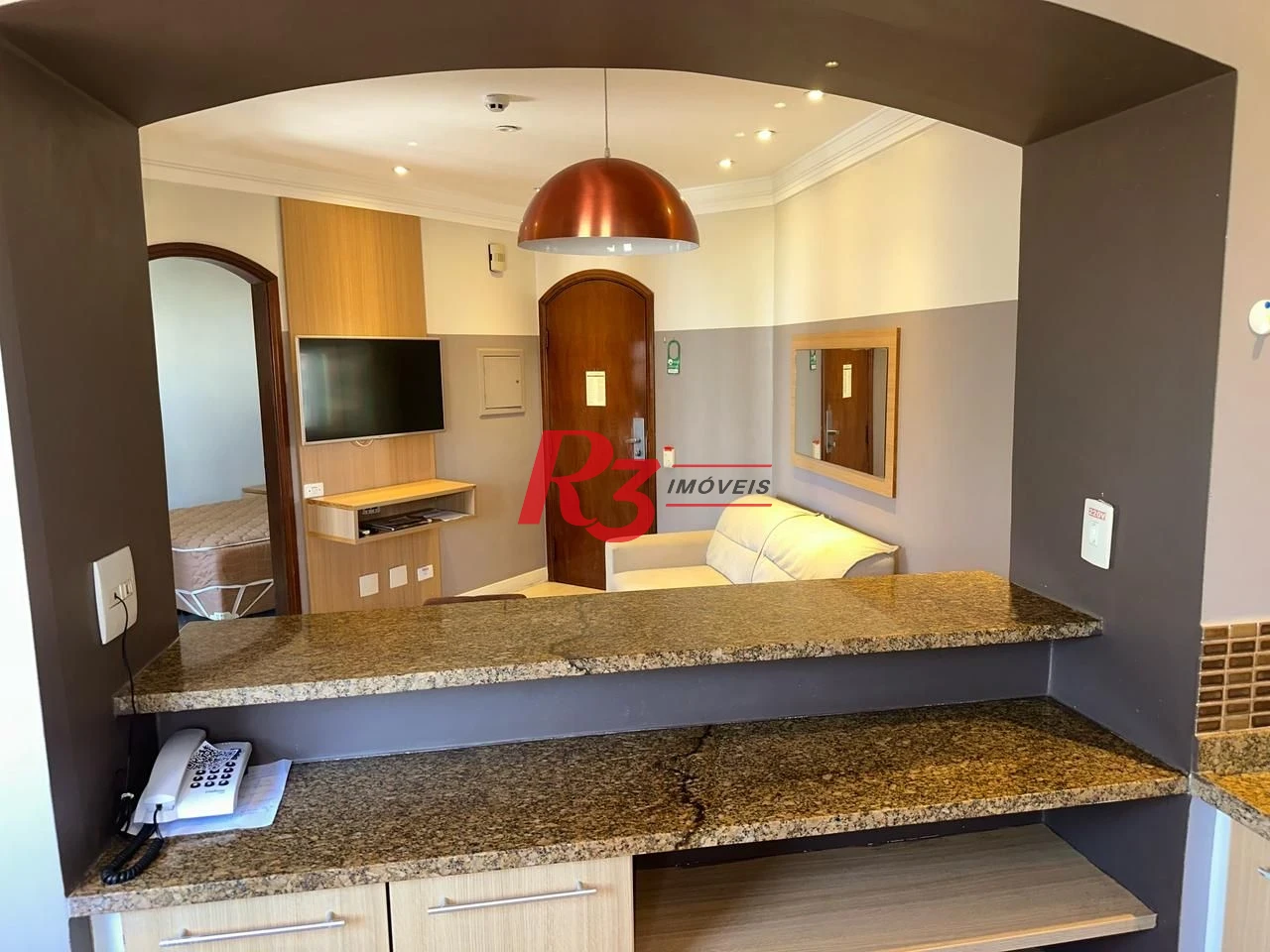 Flat 1 suíte, sala e varanda, 44 m² por R$ 450.000 - Gonzaga - Santos/SP