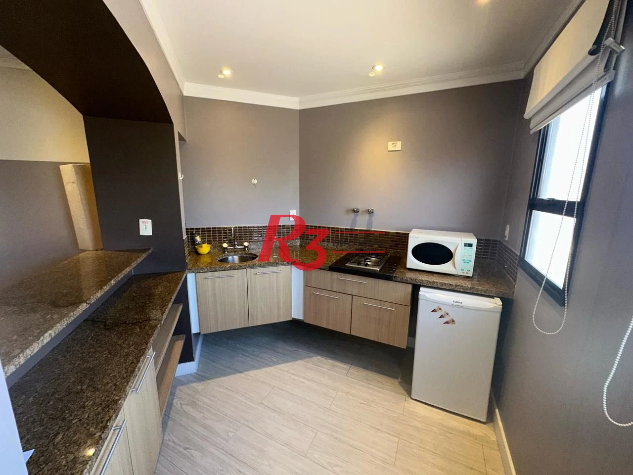 Flat 1 suíte, sala e varanda, 44 m² por R$ 450.000 - Gonzaga - Santos/SP