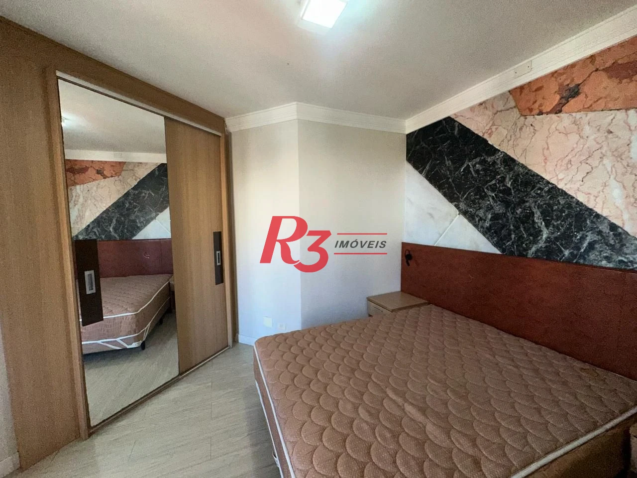 Flat 1 suíte, sala e varanda, 44 m² por R$ 450.000 - Gonzaga - Santos/SP