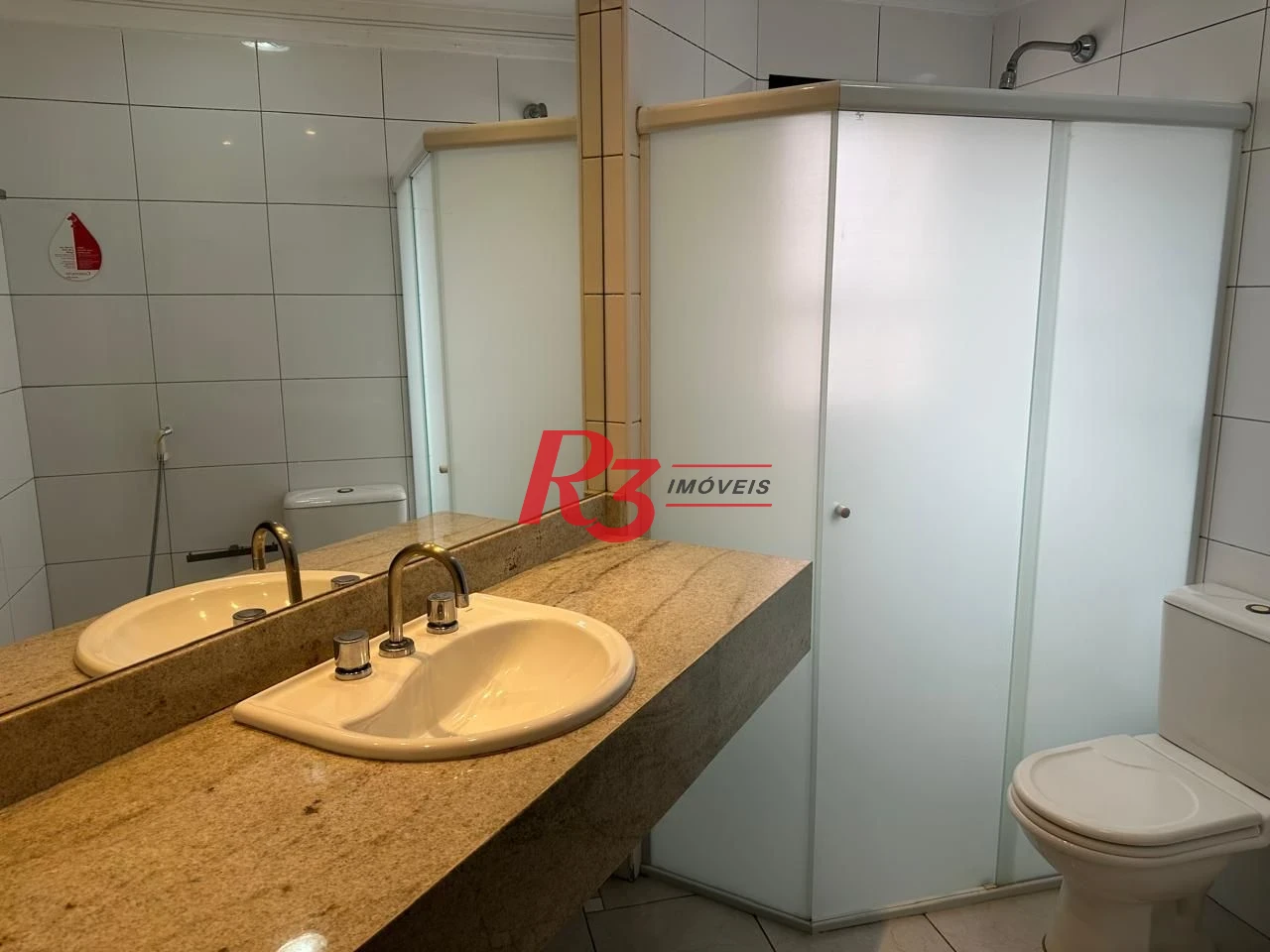 Flat 1 suíte, sala e varanda, 44 m² por R$ 450.000 - Gonzaga - Santos/SP