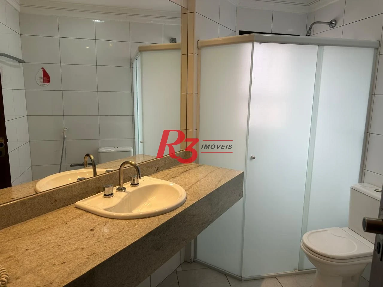 Flat 1 suíte, sala e varanda, 44 m² por R$ 450.000 - Gonzaga - Santos/SP