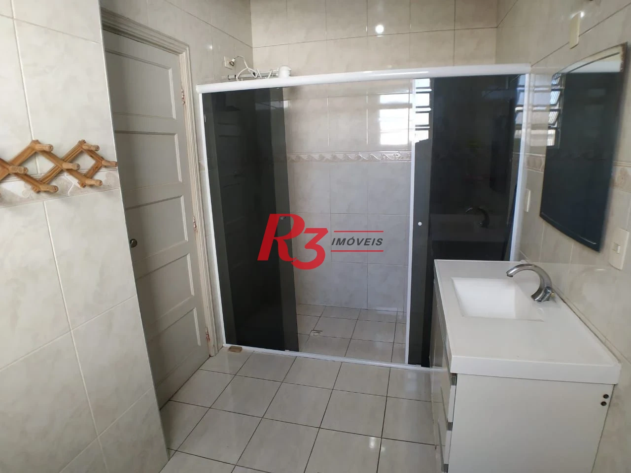 Casa com 6 dormitórios à venda, 223 m² por R$ 900.000,00 - Vila Matias - Santos/SP
