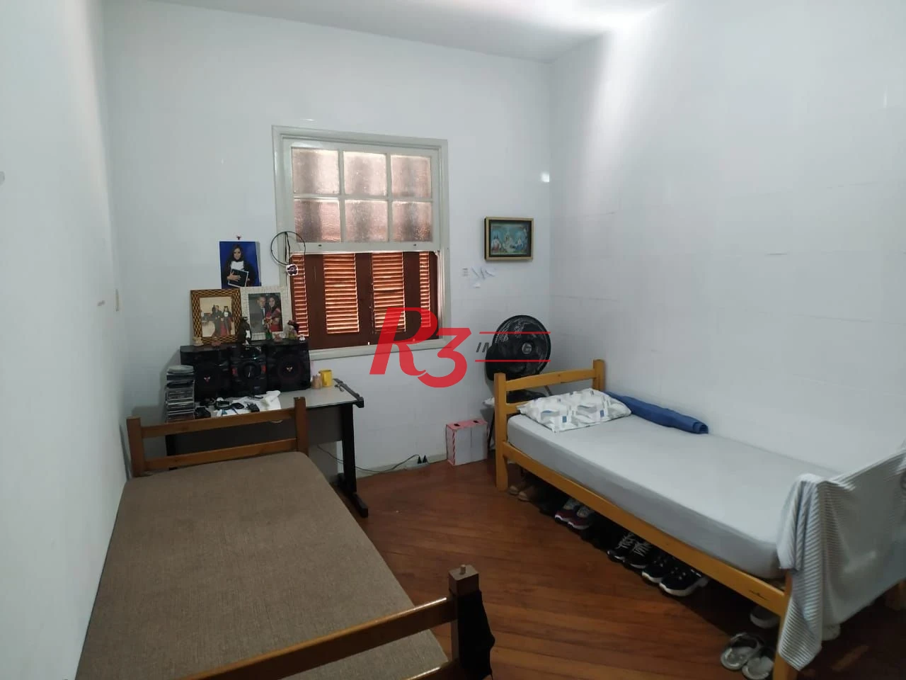 Casa com 6 dormitórios à venda, 223 m² por R$ 900.000,00 - Vila Matias - Santos/SP