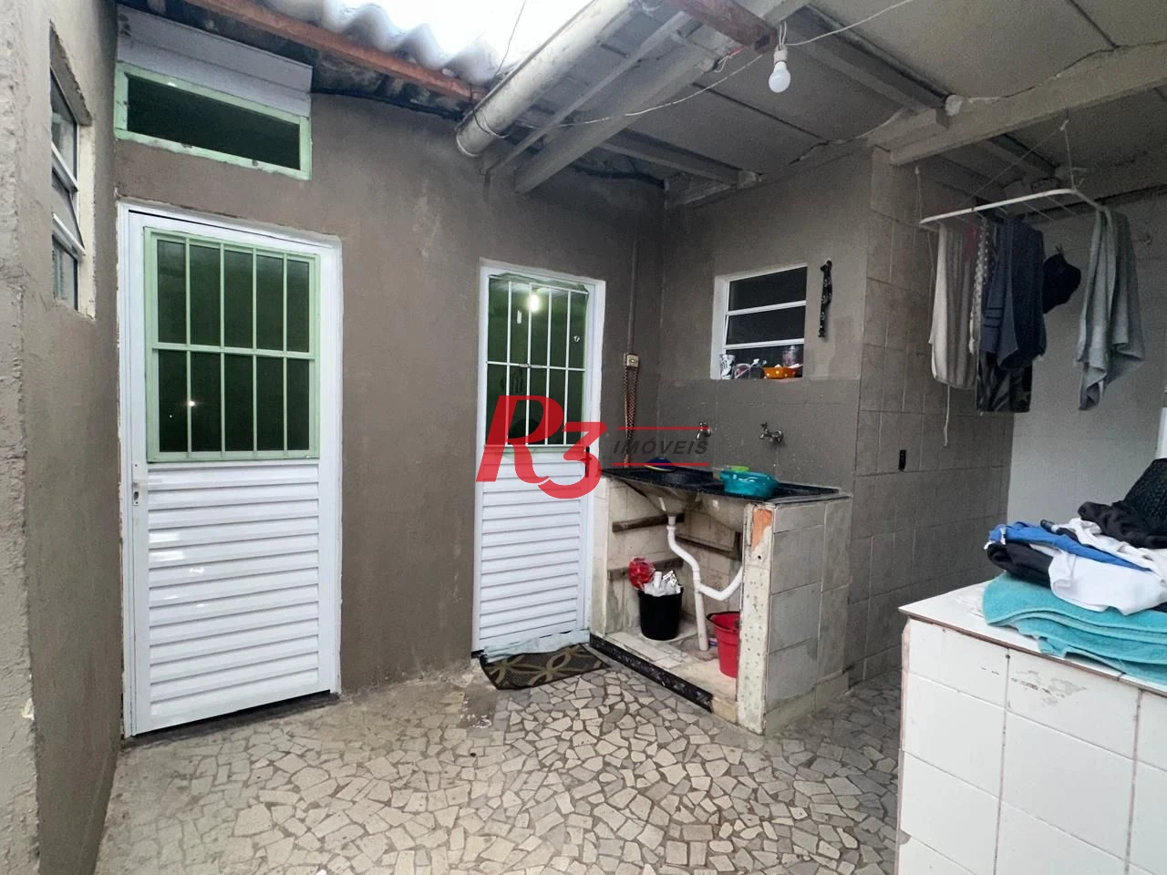 Casa com 6 dormitórios à venda, 223 m² por R$ 900.000,00 - Vila Matias - Santos/SP